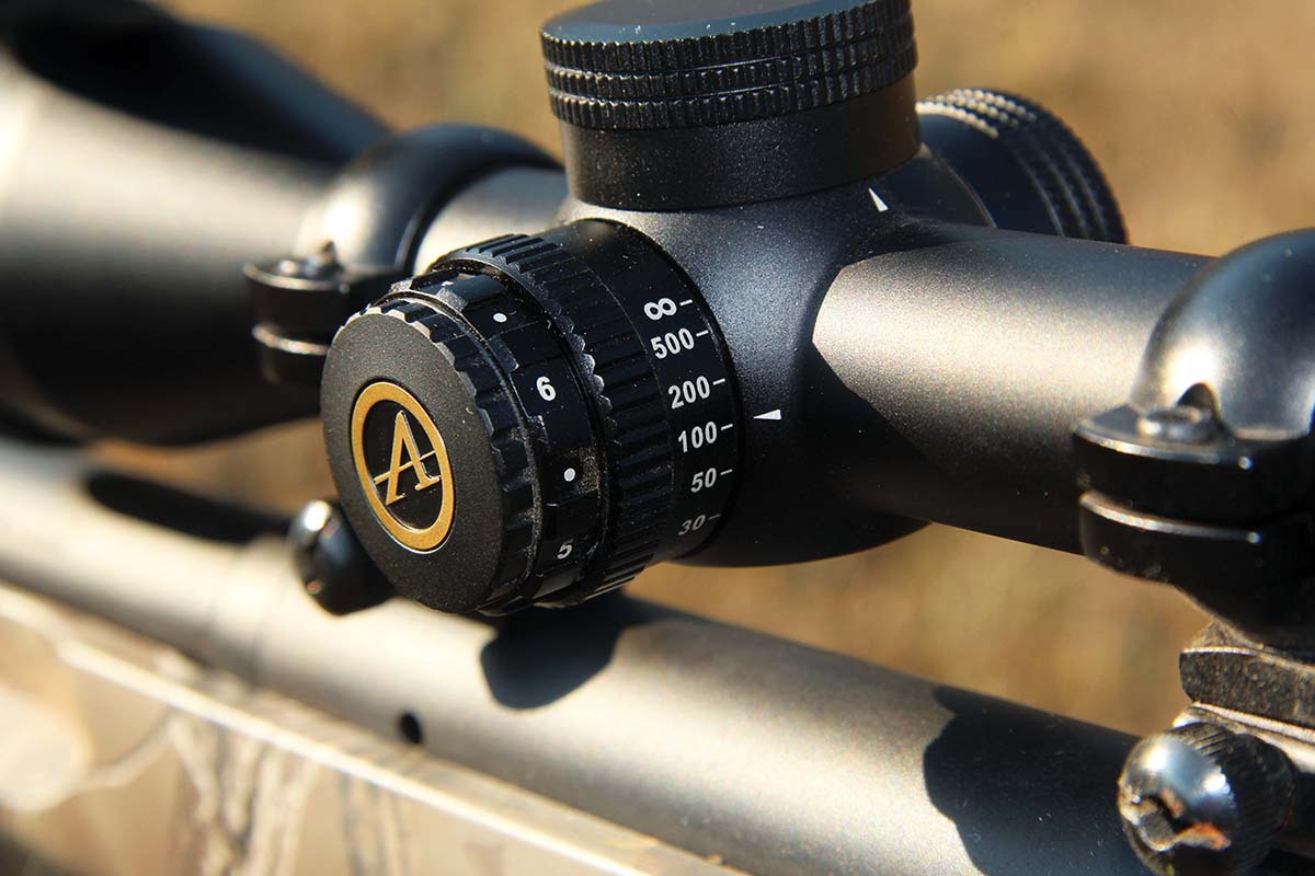 The parallax knob sandwiched between the scope body and the outer illumination wheel allows focus between 20 yards and infinity, with 20, 30, 50, 100, 200 and 500 yards marked with numerals.